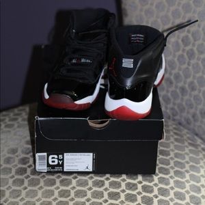 Jordan Bred 11’s size 8 women’s/6.5 kids
